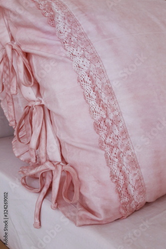 beautiful pink bed with ruffles and lace