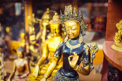  Souvenir shop in New Delhi, India  Statuettes of Indian Gods  © popovatetiana