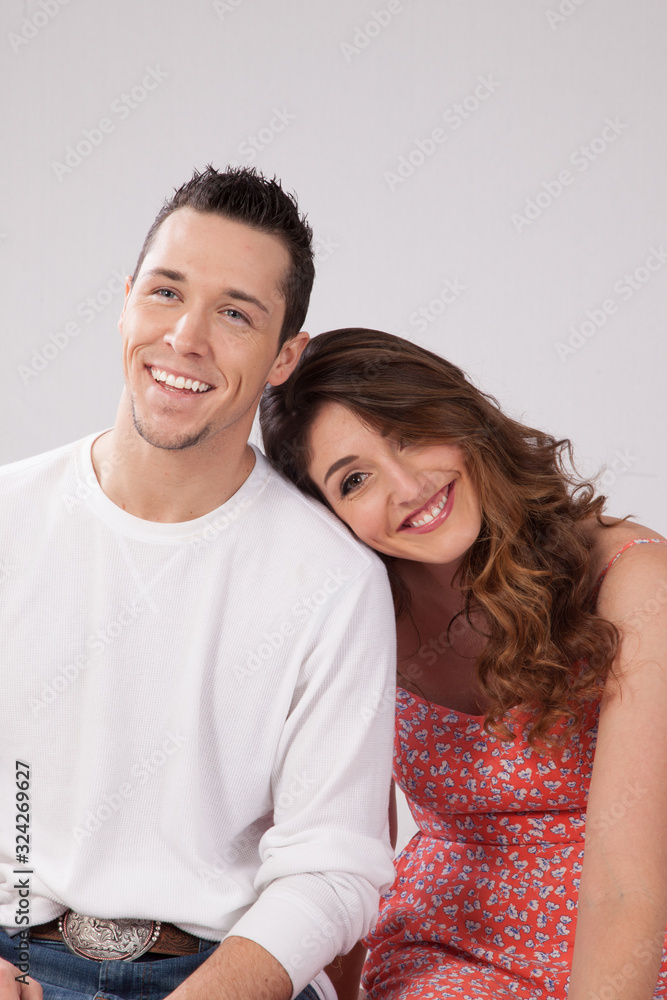 Romantic couple together smiling Romantic couple together smiling