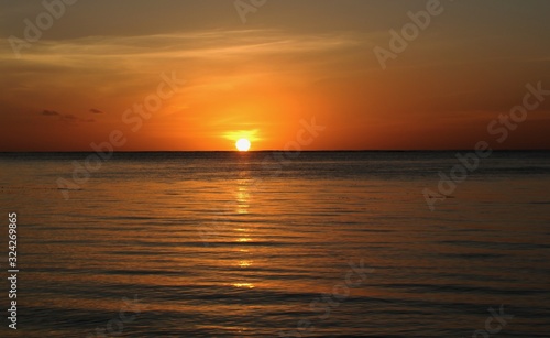 Another beautiful tropical island sunset photo in the Northern Mariana Islands. © raksyBH