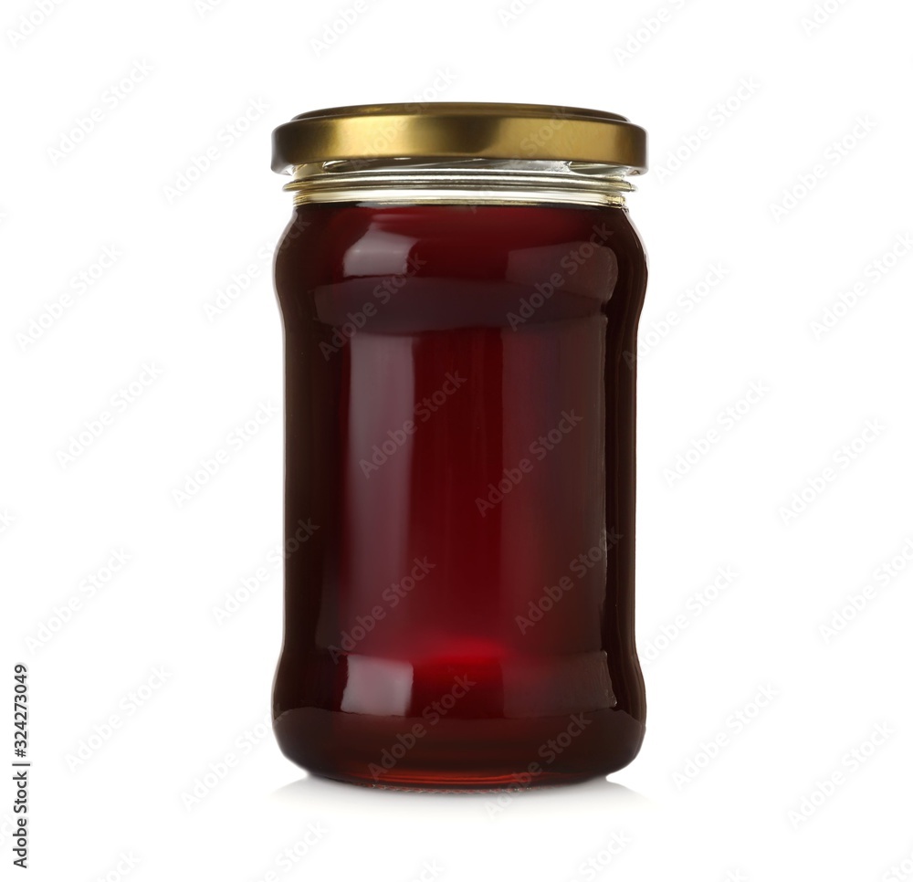 Jar with organic honey isolated on white Jar with organic honey isolated on white