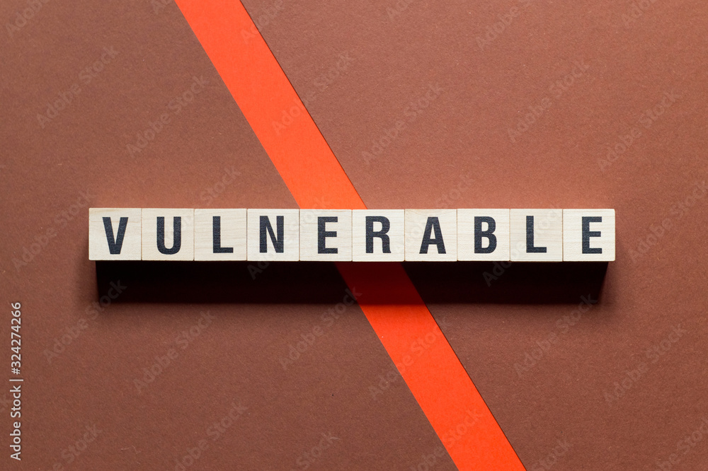 Obraz premium Vulnerable word concept on cubes