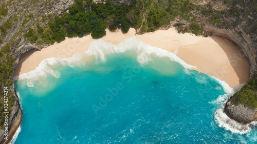 Beautiful viewpoint of Kelingking beach in Nusa Penida island, Bali, Indonesia. Drone view.