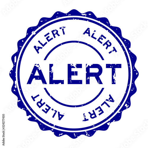Grunge blue alert word round rubber seal stamp on white background