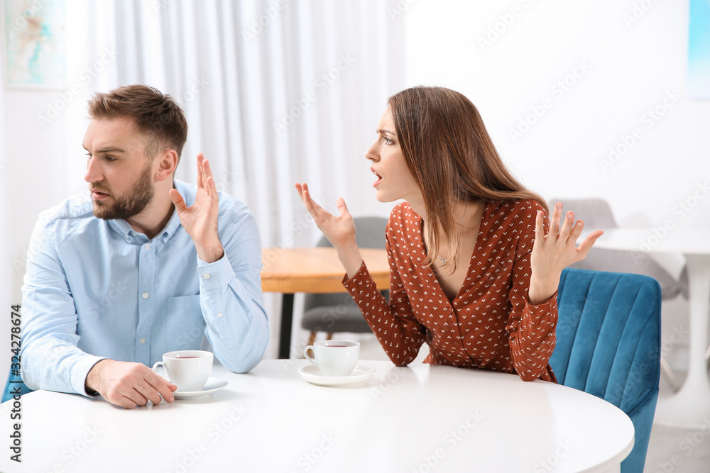Couple having quarrel in cafe. Relationship problems Couple having quarrel in cafe. Relationship problems