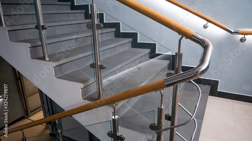 Billede på lærred Stainless steel, glass and wood railing