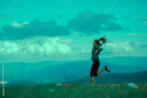 young fitness woman running at forest trail © fotoinfot