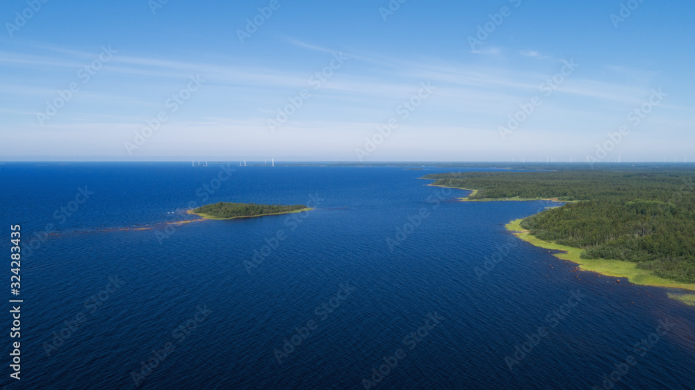 Coast island in Finland, scandinavian summer. Travel on baltic sea. Natural stone beach.