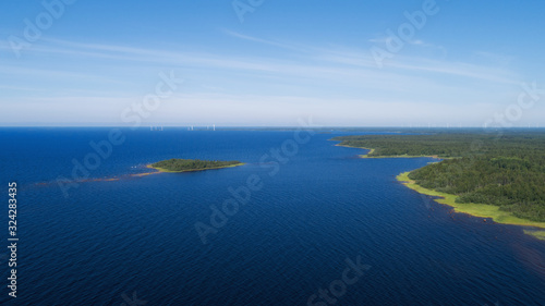 Coast island in Finland, scandinavian summer. Travel on baltic sea. Natural stone beach.