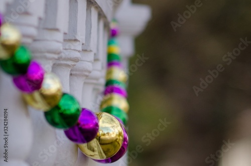 Mardi Gras Beads Decorating the Porch of an Uptown House in New Orleans  La  USA