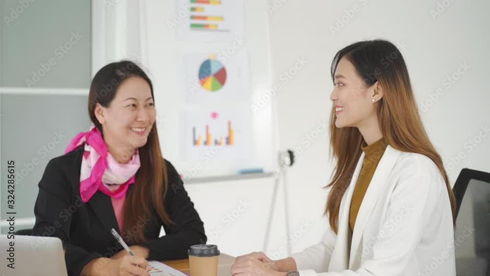 Two business woman working in company Two business woman working in company
