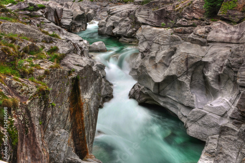 River and Rocks in Long Exposure in Valley Verzasca in Ticino  Switzerland.