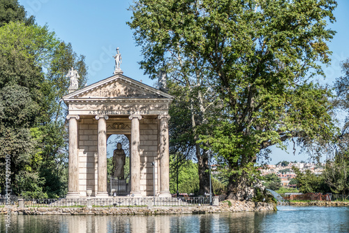 Villa Borghese pond with reflections on the water and fountains