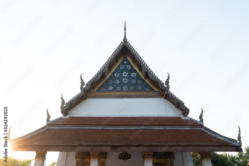 The roof of chapel (Ubosot), the white and golden building near the Amphawa floating market Samut Songkhram Thailand