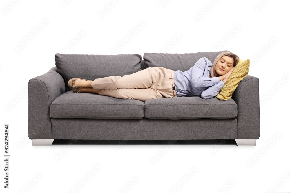 Young woman tired from work sleeping on a sofa