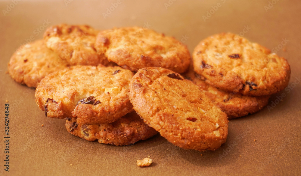 Freshly baked cookies with raisins and cashew nuts Freshly baked cookies with raisins and cashew nuts