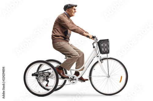 Senior man riding a tricycle