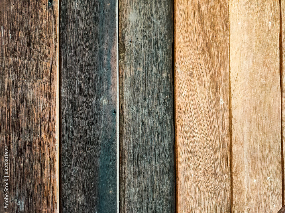 Fototapeta premium Beautiful real dark wood texture background and high surface detail in the vertical line