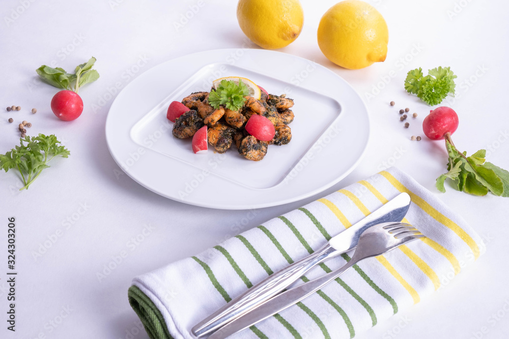 radish and ready-made shrimp dish on a white plate radish and ready-made shrimp dish on a white plate