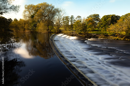 Weir on the river Wharfe at Burley in Wharfedale