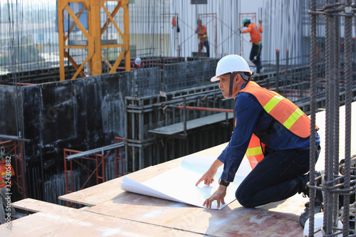 Engineers are monitoring the construction of skyscrapers exactly as designed..