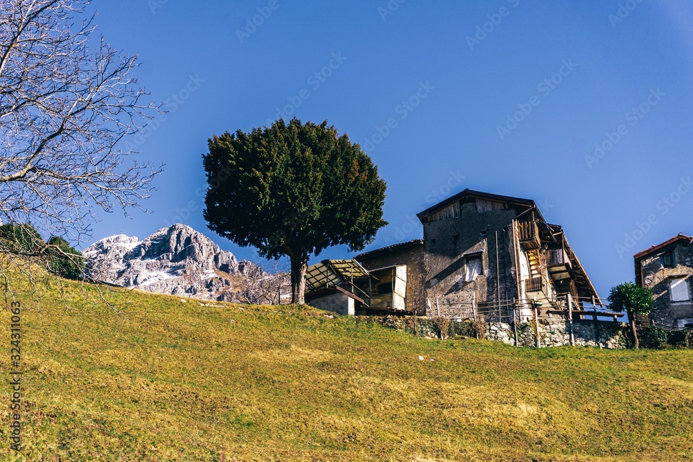 Nature and landscape during the late afternoon seen from the Lombard Mountains above the city of Lecco, Italy - February 2019. Nature and landscape during the late afternoon seen from the Lombard Mountains above the city of Lecco, Italy - February 2019.