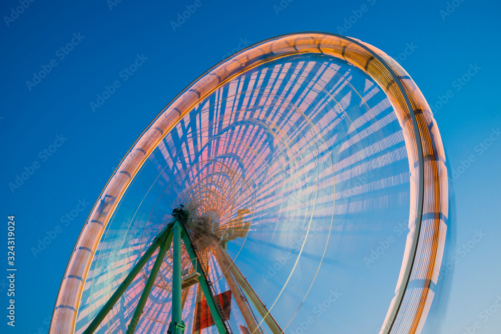 Germany, North Rhine-Westphalia, Cologne, part of lighted turning big wheel at blue hour