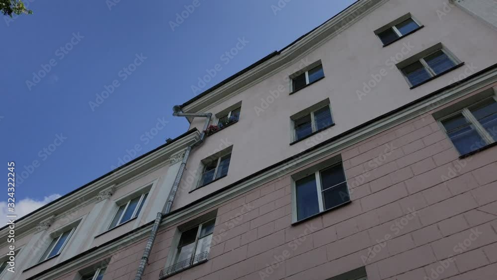 Beautiful old house on a background of blue sky. Beautiful old house on a background of blue sky.