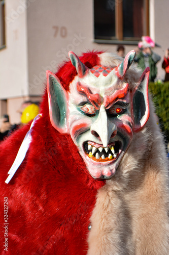 demon mask on the carneval procession in Talheim 2020 photo