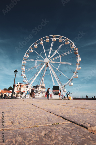 Ferris Wheel Over Blue Sky © nvphoto