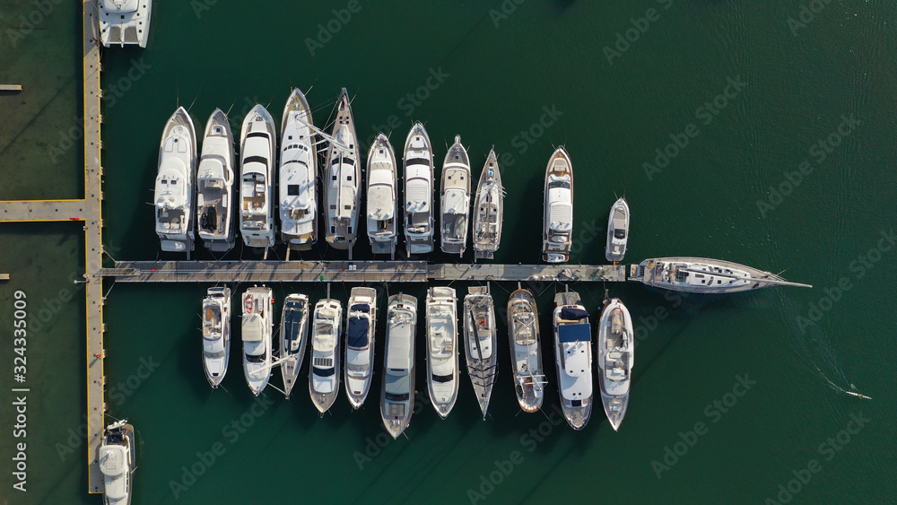 Aerial drone top down photo of yachts docked in famous round port of Zea or Passalimani, Piraeus, Attica, Greece Aerial drone top down photo of yachts docked in famous round port of Zea or Passalimani, Piraeus, Attica, Greece