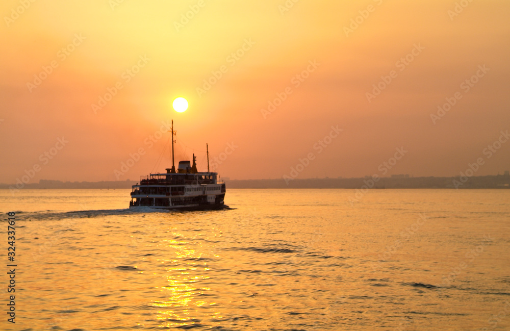Ferry boat at sunset at Bosphorus, Istanbul, Turkey