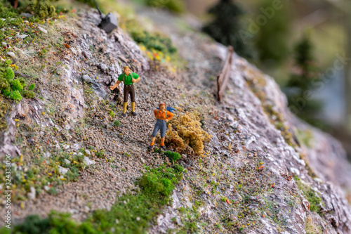 couple of walker in the mountains with scenic model landscape