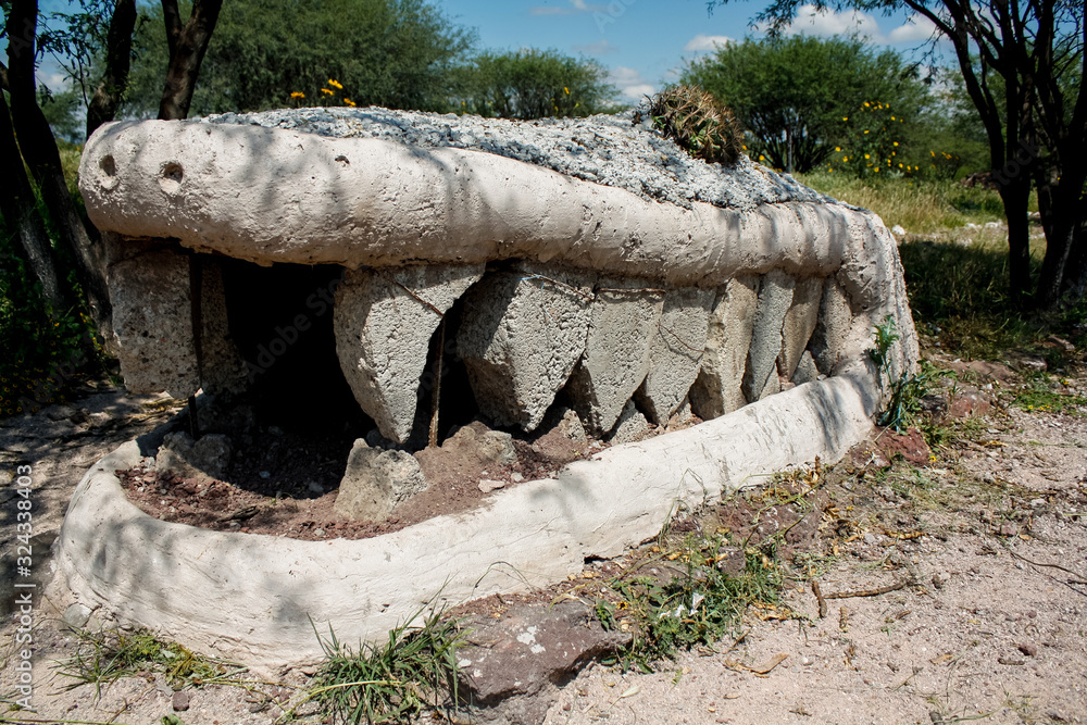 Fototapeta premium quetzalcoatl sculpture at the entrance or Tula archaeological site