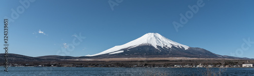 Japanese Fuji mountain on blue sky with copy space.