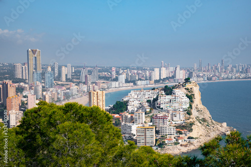 View from the air of Levante beach Panoramic of the city of Bendorm from the castle of Finestrat beach with the mountains in the background photo