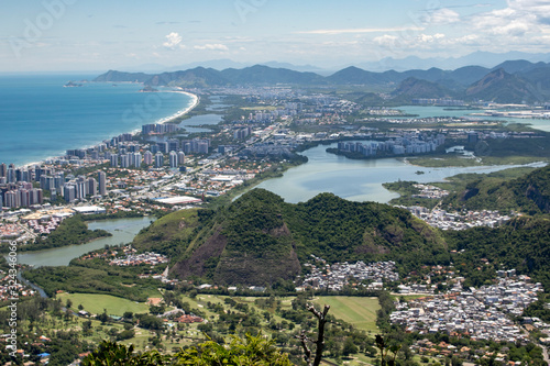 Barra da Tijuca neighbourhood with city lake, high rise buildings and golf club course in the foreground seen from the Pedra Bonita rock in the Tijuca forest