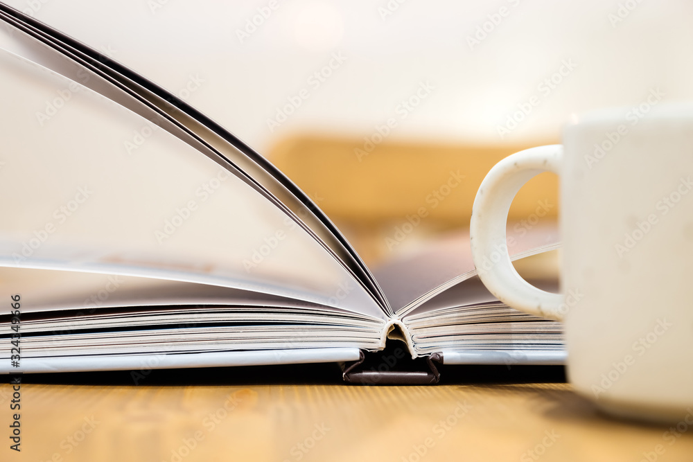 Fototapeta premium Opened Book on the Table