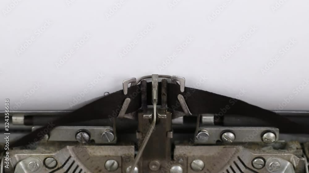 typing text coronavirus, concept of pandemic outbreak, old vintage typewriter with a white sheet of paper typing text coronavirus, concept of pandemic outbreak, old vintage typewriter with a white sheet of paper