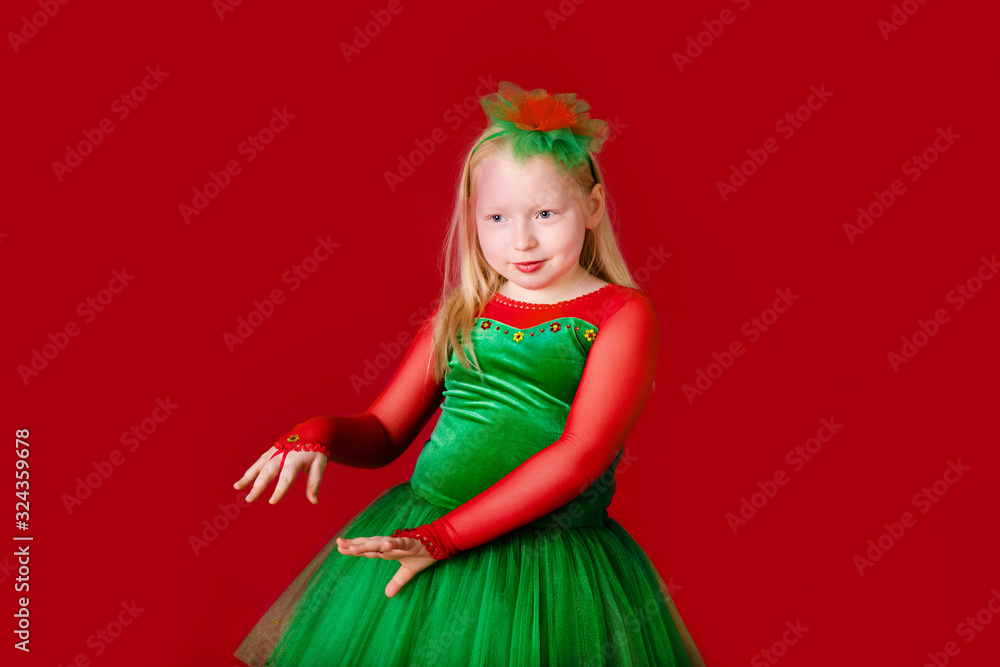Kid dancer satisfied with concert outfit. Kids fashion. Kid fashionable green dress looks adorable. Clothes for ballroom dance. Ballroom dancewear fashion concept. Kid dancer satisfied with concert outfit. Kids fashion. Kid fashionable green dress looks adorable. Clothes for ballroom dance. Ballroom dancewear fashion concept.