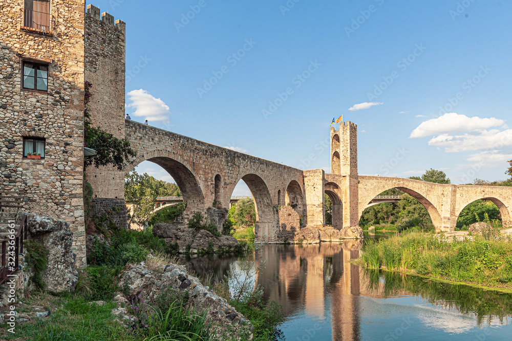 Romanesque defensive bridge over the Fluvia River in Besalu, Catalonia.