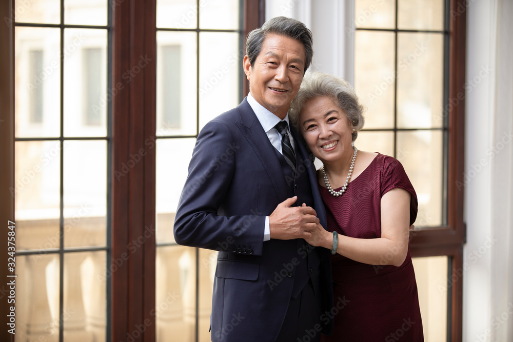Loving senior Chinese couple at home Loving senior Chinese couple at home