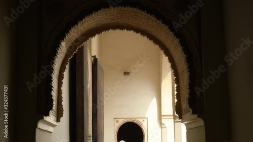 Nasrid arcs in the interior of the muslim palace of the Alcazaba, Malaga, Spain photo