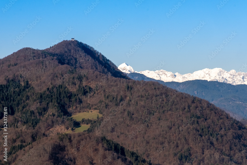 Fototapeta premium Winter view form Osolnik towards Lubnik and Triglav
