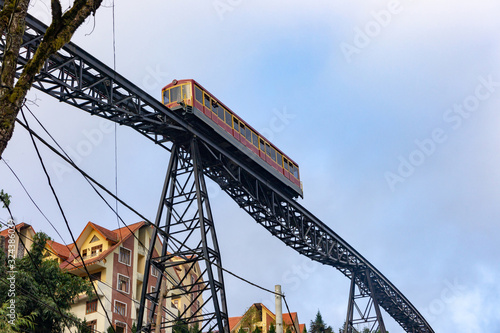 bottom view on the rails of the funicular legend. Unique bridge. Funicular on Fancipan photo