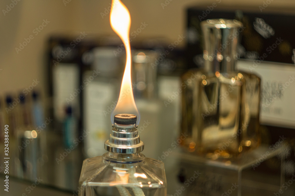 A catalytic, purifying lamp . Lampe Berger, fragrance lamp, perfume lamp,  effusion lamp, catalytic lamp, aroma lamp, aroma therapy, air purification.  foto de Stock | Adobe Stock