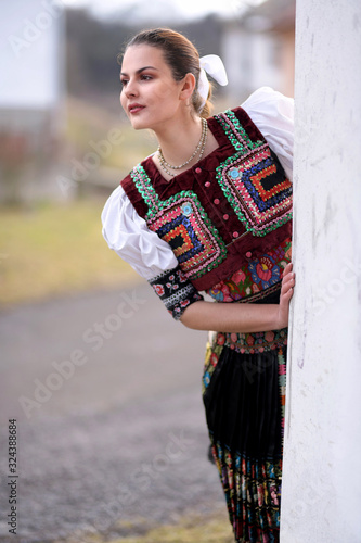 Young beautiful slovak woman in traditional costume