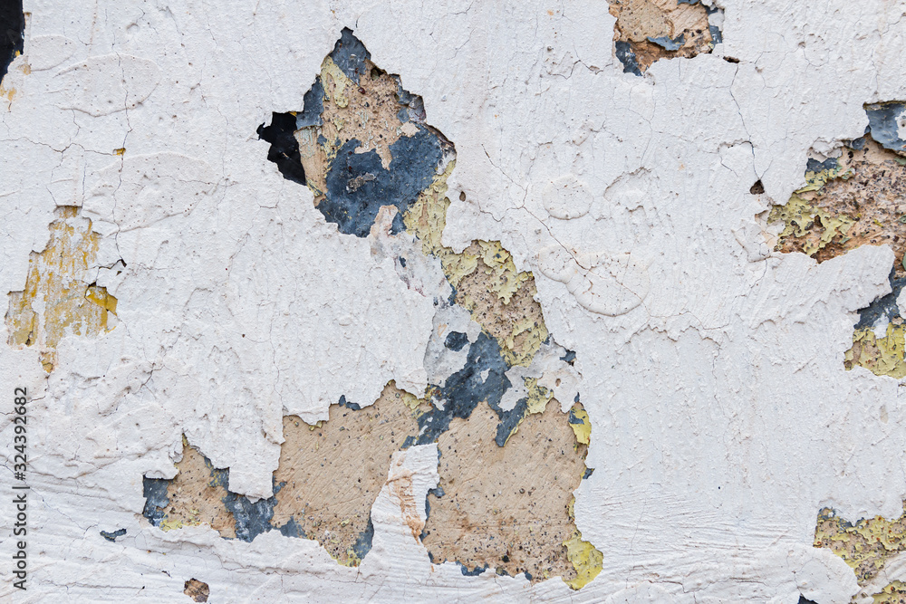 texture of old wall with peeling paint 
