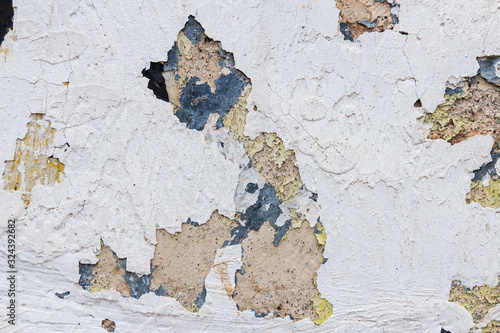 texture of old wall with peeling paint 