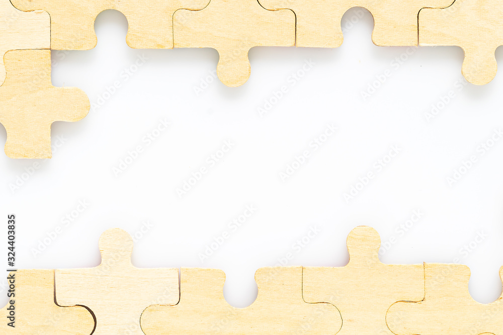 wooden jigsaw puzzle pieces on white background wooden jigsaw puzzle pieces on white background